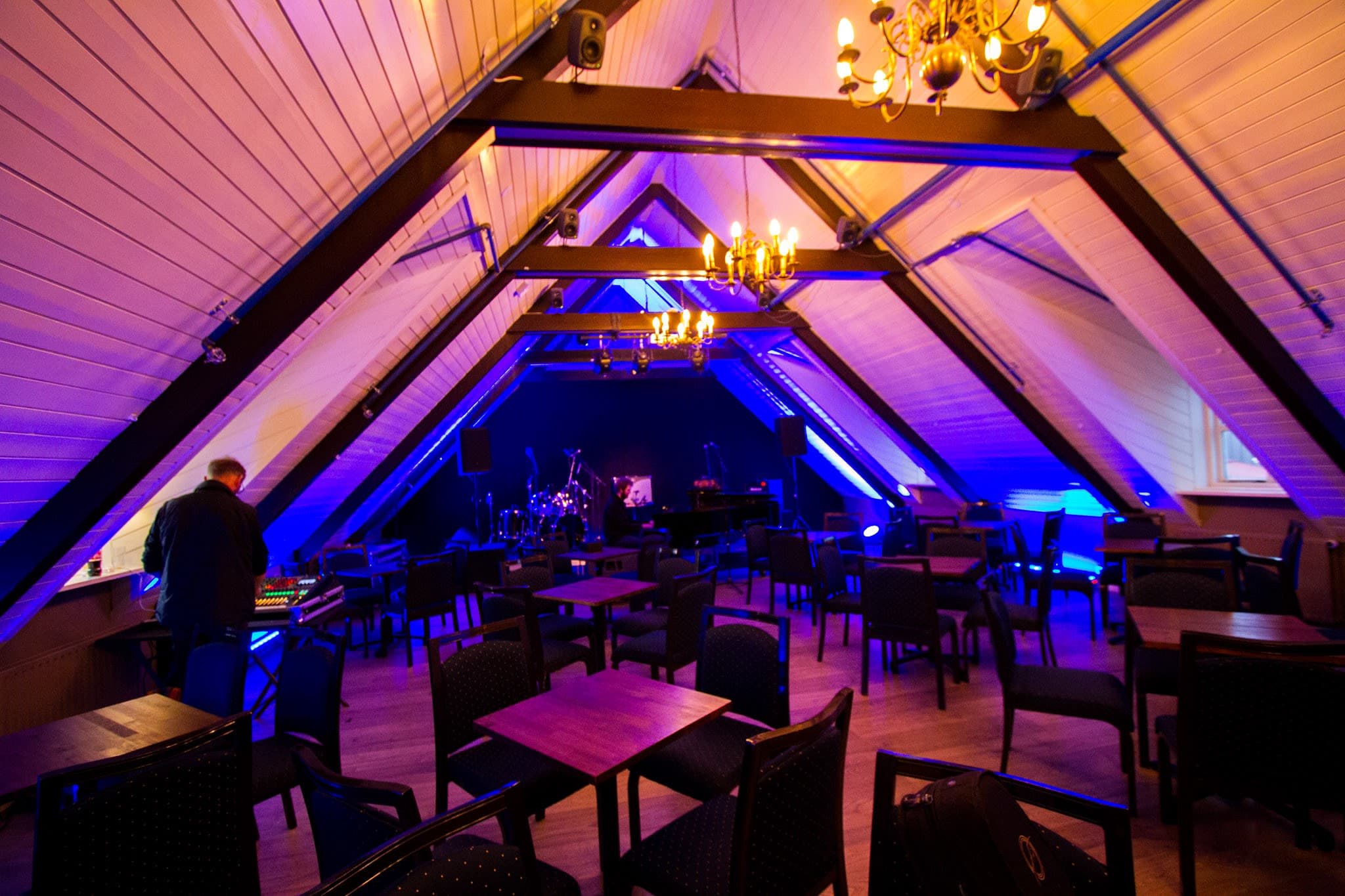Kornhlaðan bathed in blue light